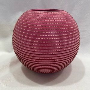 Crate and barrel pink round leather vase 5 1/2 inches tall 6 inches wide